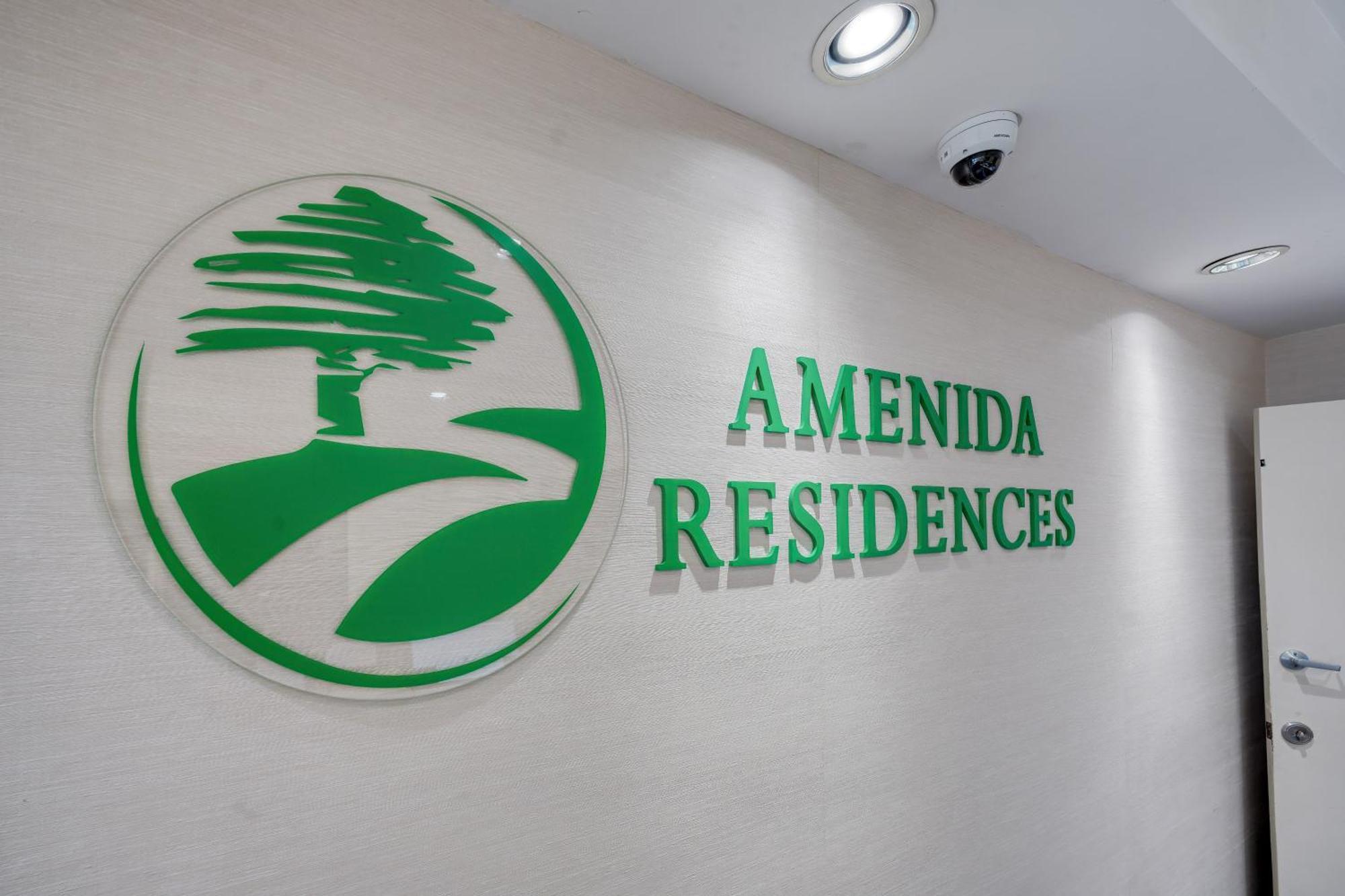 Amenida Residences, YYC Екстериор снимка